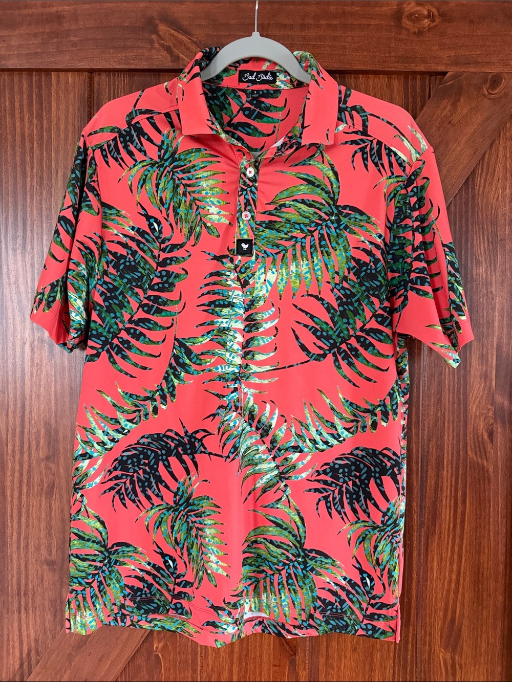 Bad Birdie Coral Palm Print Performance Polo
